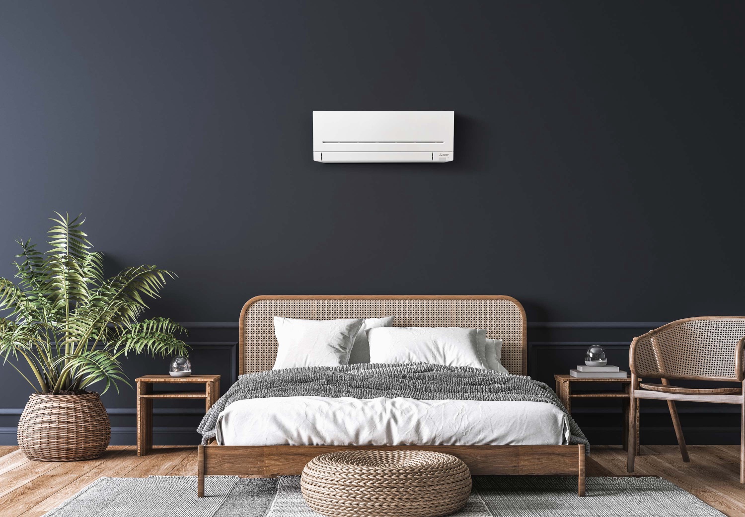 Mitsubishi Electric AP Smart heat pump in a dark, modern bedroom